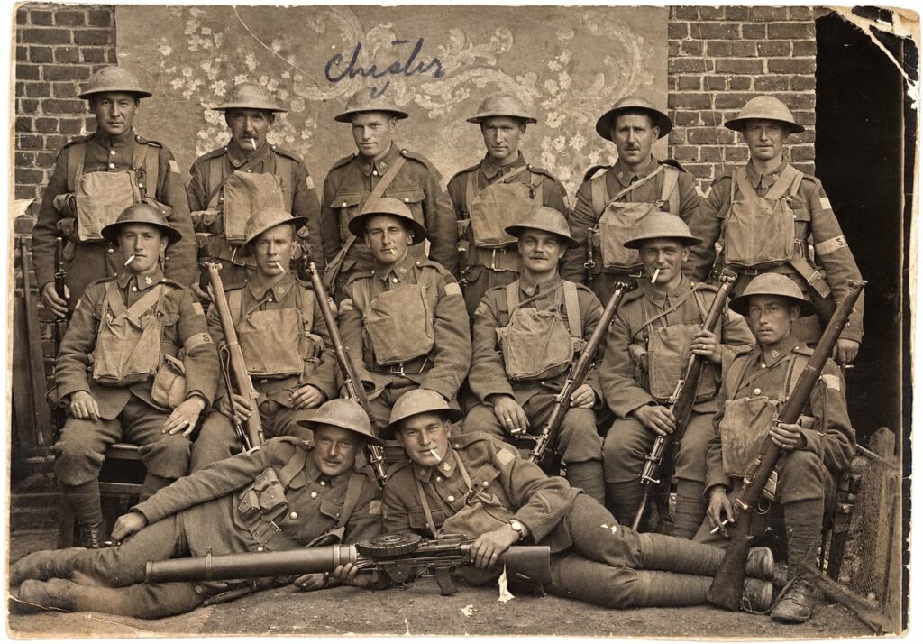 Alexander Decoteau: Archival WWI soldiers group portrait. Alexander Decoteau is the man at the far left in the back row